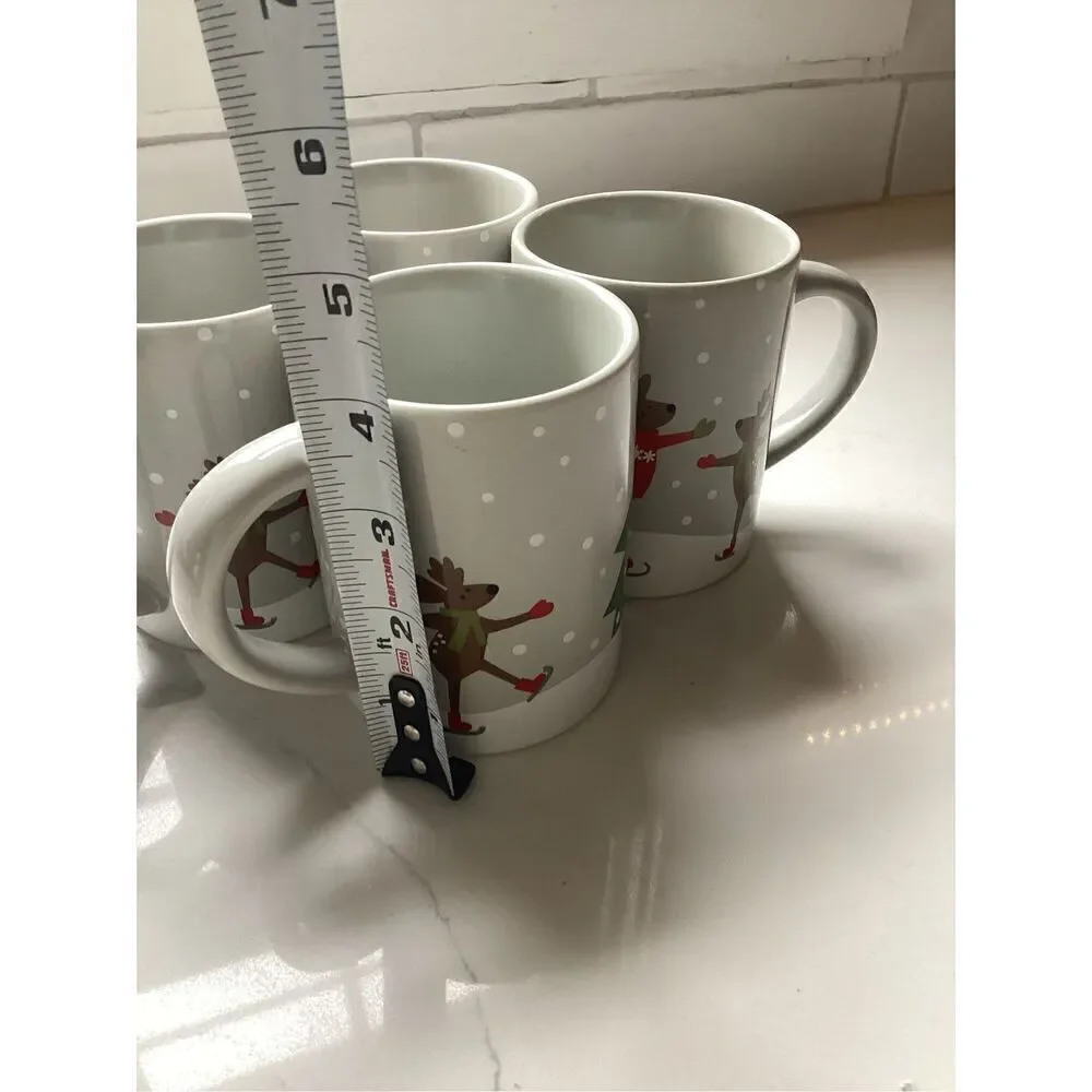 Set of 4 Crate & Barrel 12oz Ceramic Coffee Mugs Joan Anderson Skating Reindeer